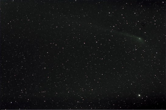 300mm f/5.6, ISO 400, 11 x 5 min. Stacked on stars and comet.